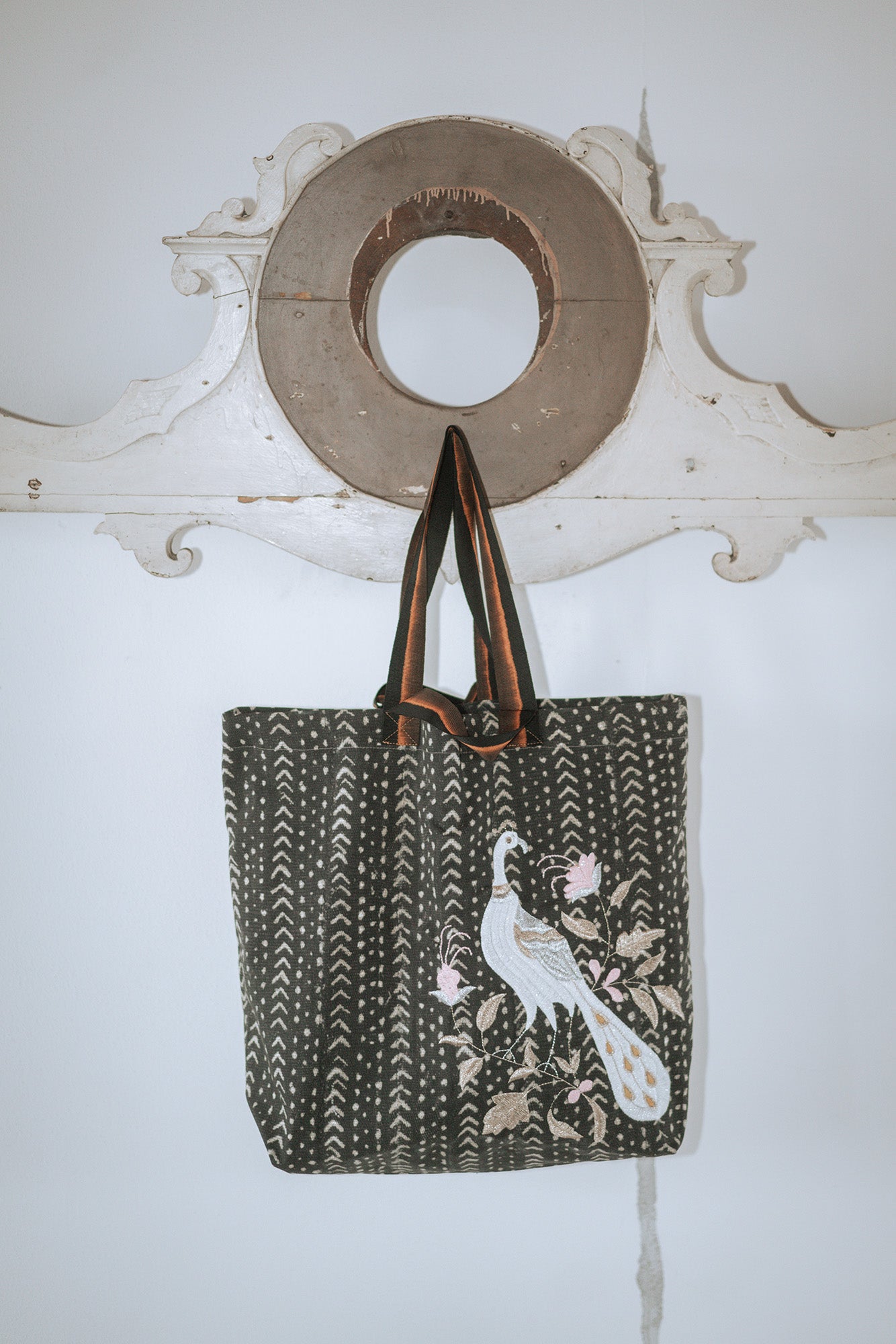 A blue peackoc bag
