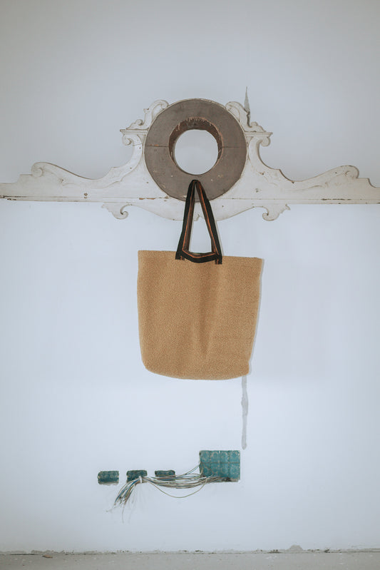 A yellow Prayers bag