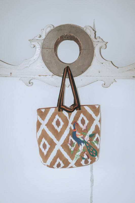 A velvet peackoc bag