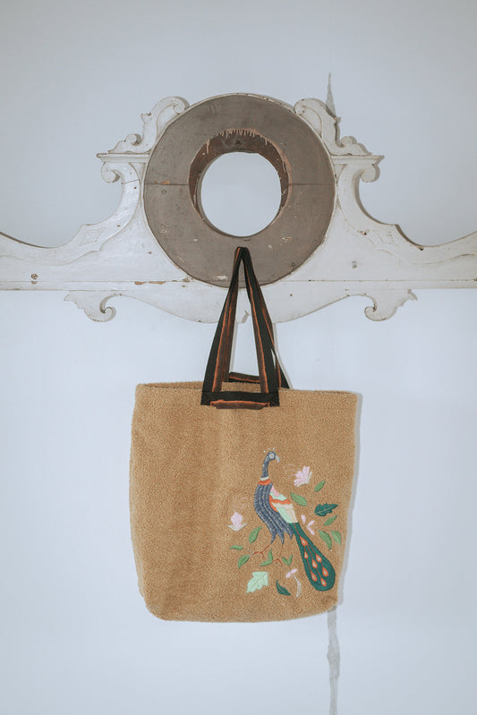 A yellow Prayers bag